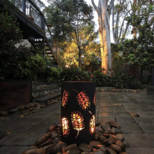 https://dbtczeve9h2jt.cloudfront.net/wp-content/uploads/2016/10/Small-Round-Fire-Pit-with-Grevillea-Pattern.png